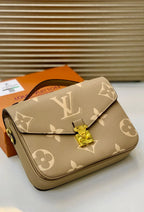 Louis Vuitton Giant Monogram Empreinte Pochette Métis Glammy