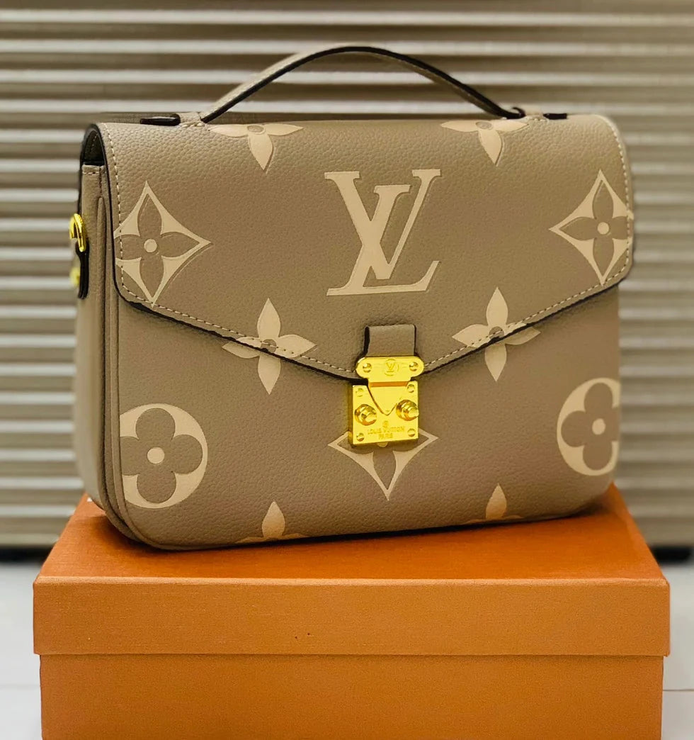 Louis Vuitton Giant Monogram Empreinte Pochette Métis Glammy